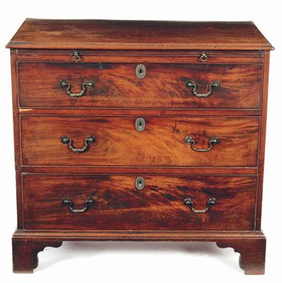 Appraisal: A George III mahogany chest the moulded edge top above