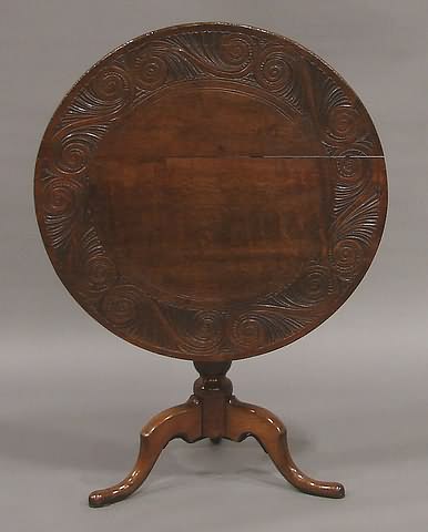 Appraisal: Border of circular top with large S-scrolls tapered turned round