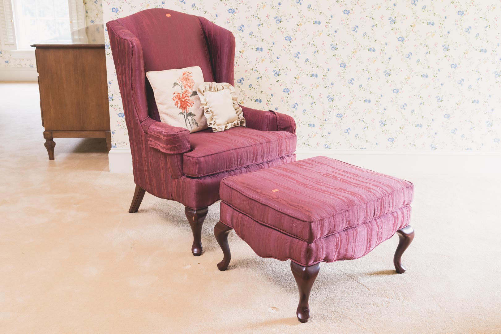 Appraisal: Queen Anne style cherry upholstered wing chair with matching ottoman