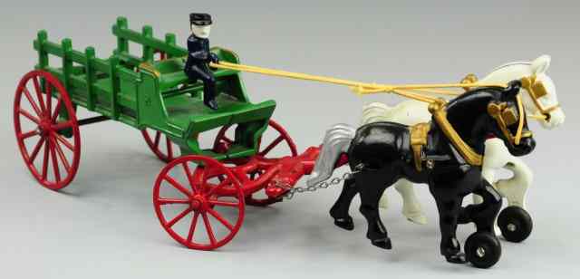 Appraisal: KENTON HORSEDRAWN STAKE WAGON Cast iron stake body painted in