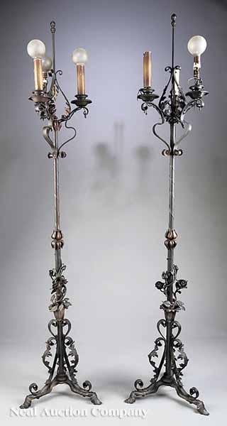 Appraisal: A Pair of Wrought Iron Paint-Decorated Torch res early th