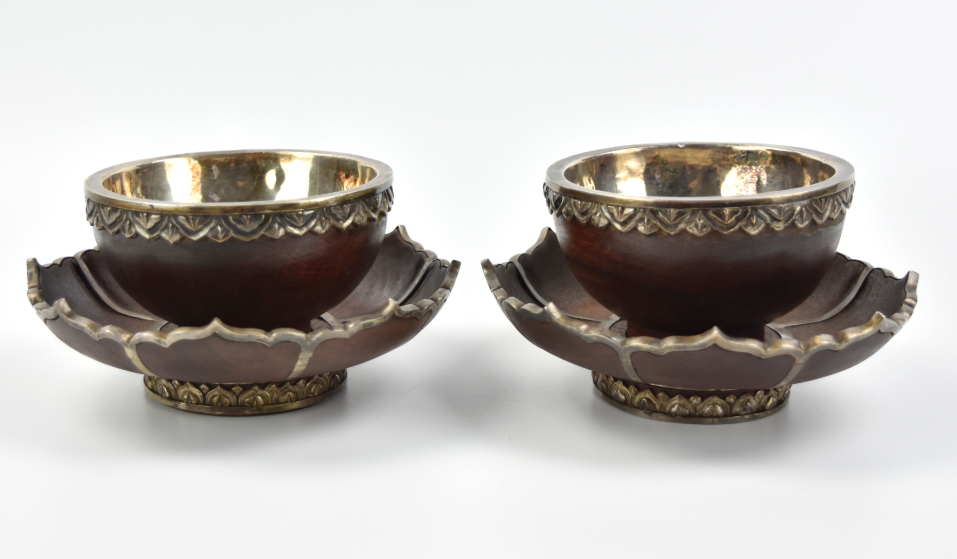 Appraisal: pair of bamboo bowls and floral-shaped plates set Covered with