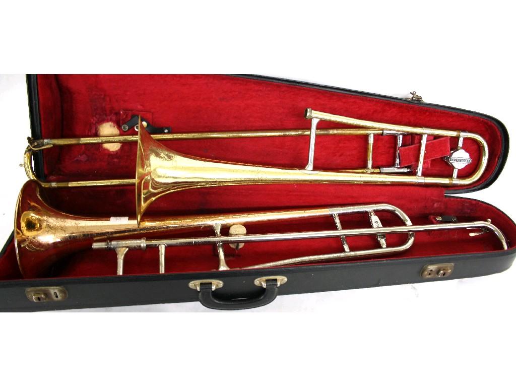 Appraisal: Holton Collegiate brass trombone case together with a Yamaha trombone