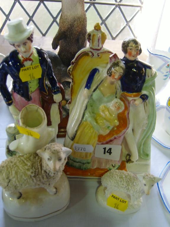 Appraisal: A th century Staffordshire figure group of Queen Victoria The