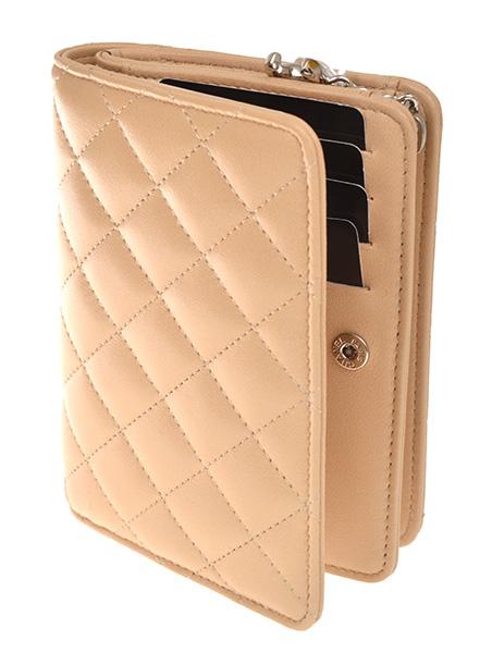 Appraisal: A LADIES WALLET BY CHANEL Styled in quilted beige calfskin