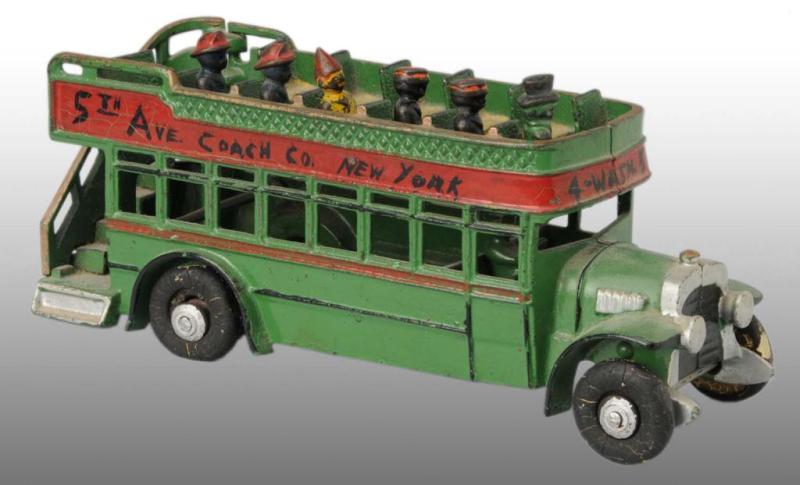 Appraisal: Cast Iron Arcade Double Decker Bus Toy Description Includes separate