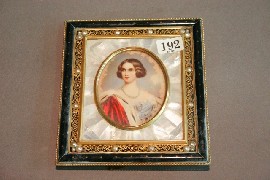 Appraisal: Two portrait miniatures one of a lady wearing ermine lined