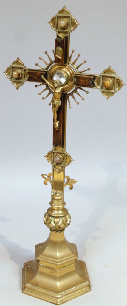 Appraisal: An early thC brass and wooden church crucifix centred by