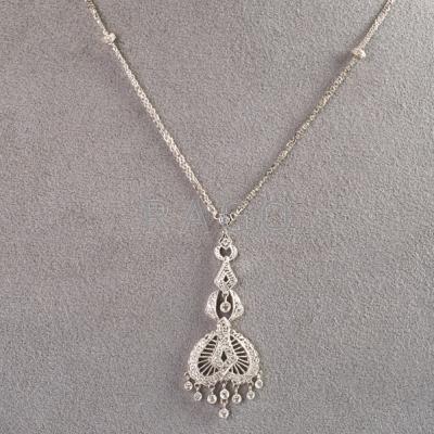 Appraisal: DIAMOND K WHITE GOLD LAVALIER th C Filigree pendant on