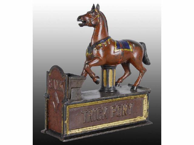 Appraisal: Cast Iron Trick Pony Mechanical Bank with Key Description Maroon