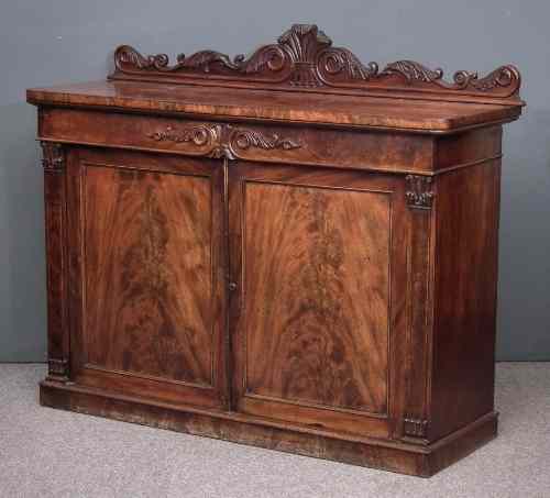 Appraisal: A William IV figured mahogany chiffonier with leaf carved and