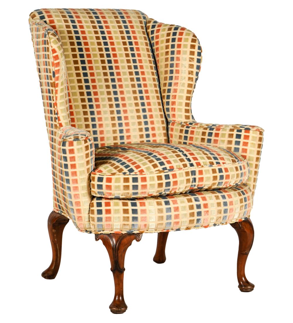 Appraisal: GEORGIAN-STYLE WING CHAIRcovered with Lee Jofa Redington Velvet Porcelain upholstery