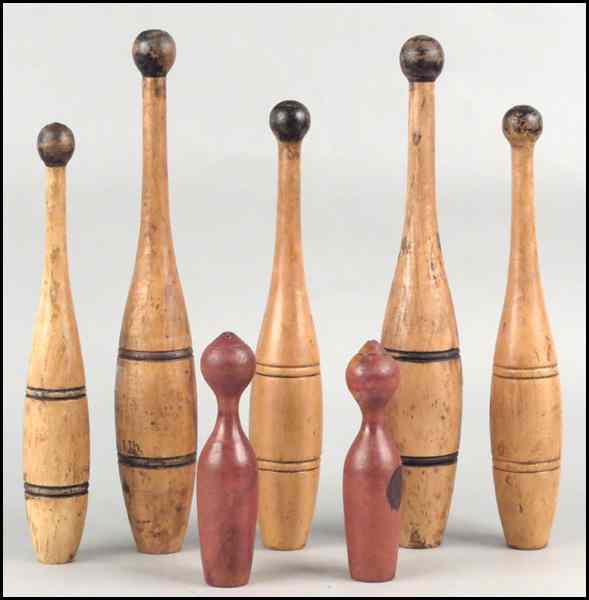 Appraisal: FIVE TURNED WOOD INDIAN CLUBS Together with a pair of