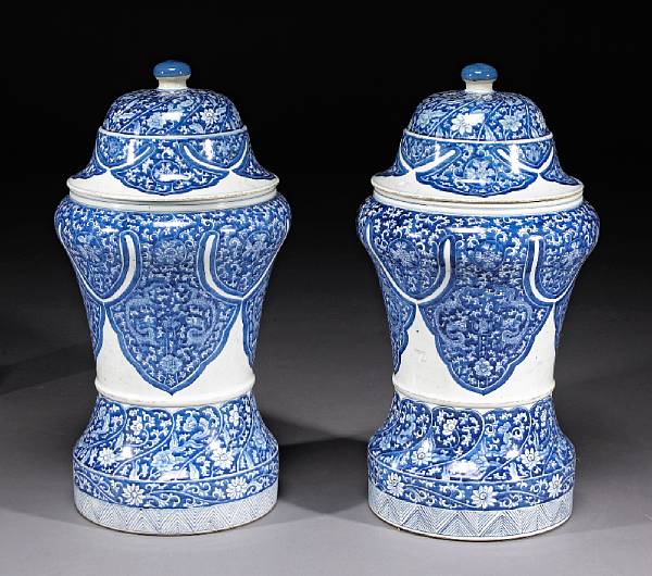 Appraisal: A pair of blue and white porcelain covered baluster jars