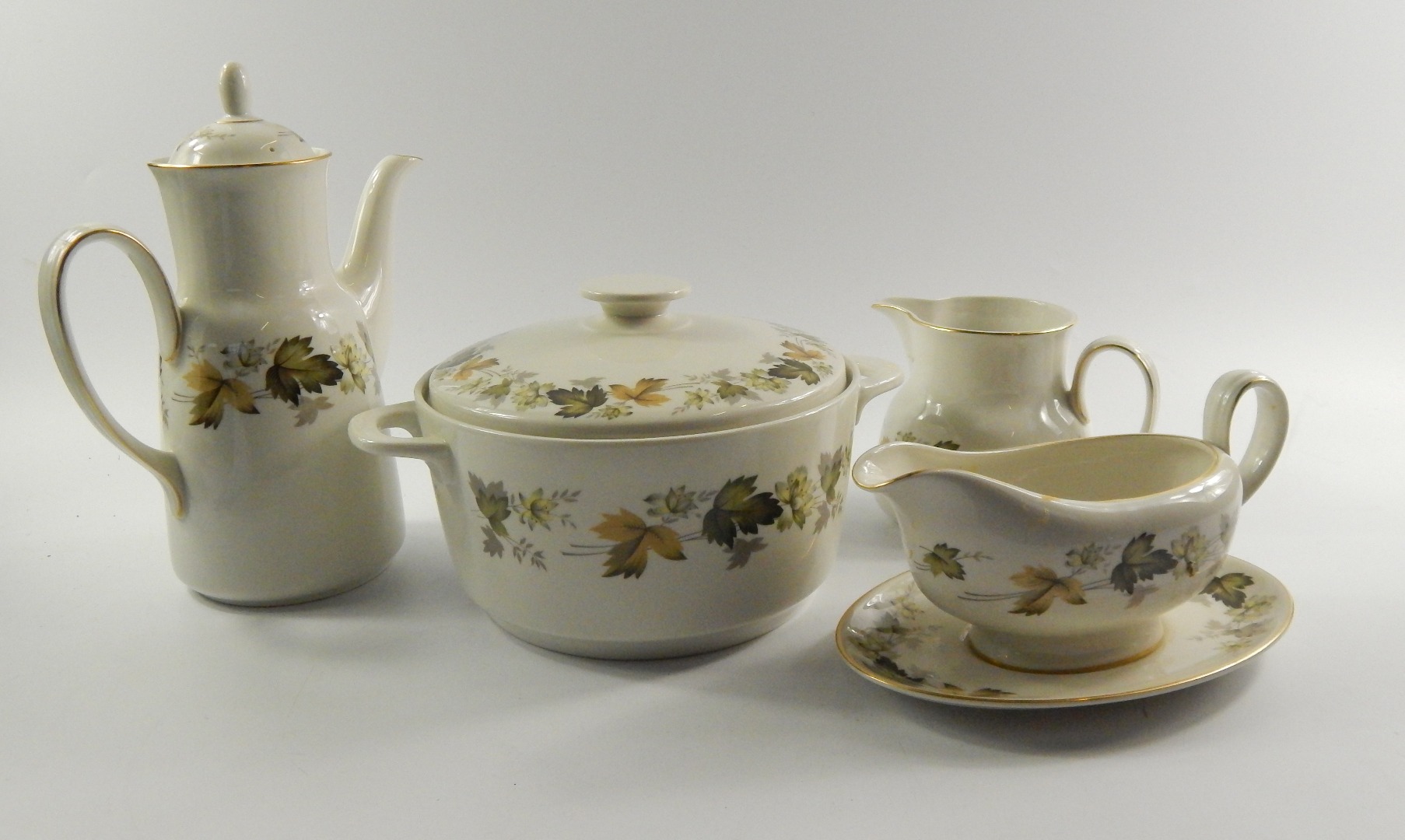 Appraisal: A Royal Doulton porcelain part dinner and coffee service decorated