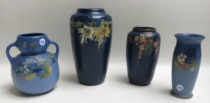 Appraisal: FOUR WELLER ART POTTERY VASES in blue glazes with floral