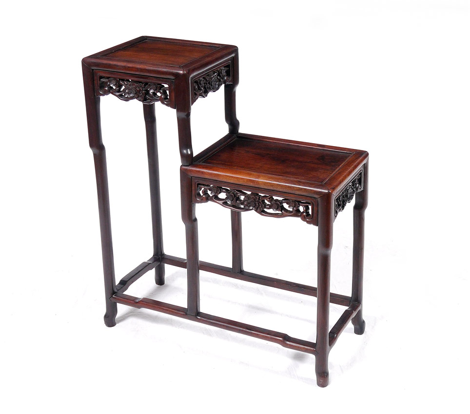 Appraisal: CHINESE ROSEWOOD TIERED TABLE tiers with each tier haveing carved