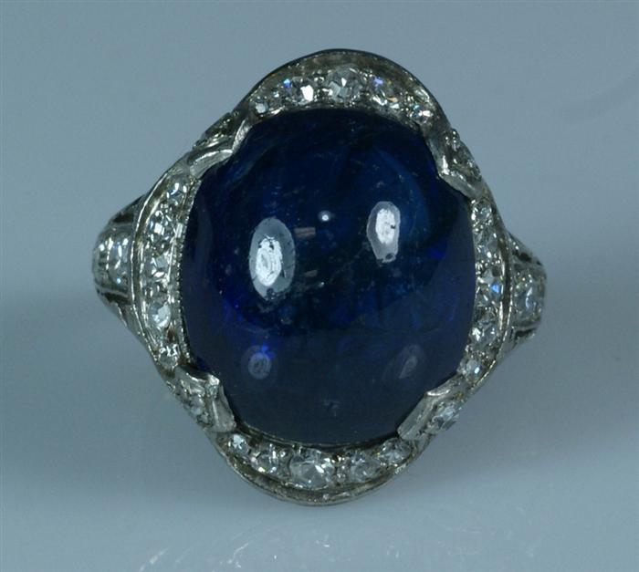 Appraisal: Platinum and diamond ring with cabochon sapphire stone measures mm