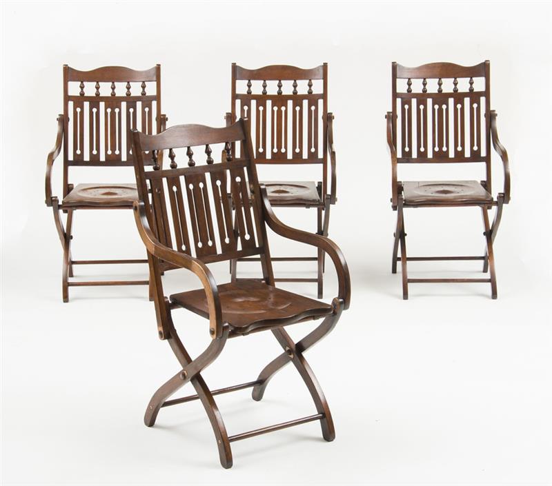 Appraisal: FOUR ANGLO-INDIAN TEAK AND BRASS-MOUNTED FOLDING CAMPAIGN CHAIRS Circa x