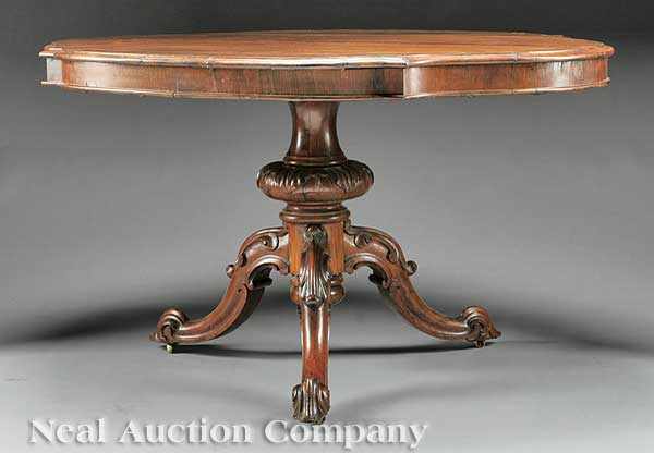 Appraisal: An English Carved Rosewood Serpentine Table mid- th c molded