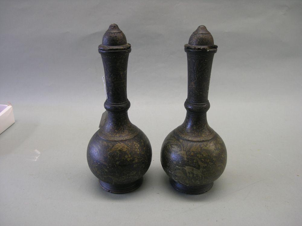 Appraisal: A pair of th century North Indian ceramic vases silvered