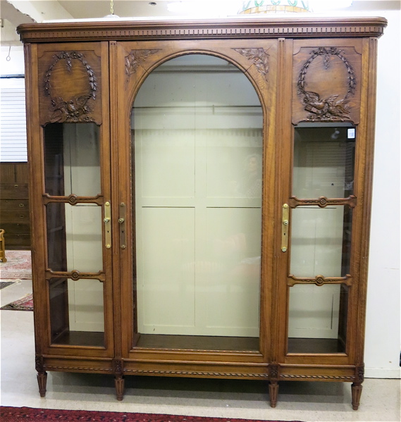 Appraisal: LARGE LOUIS XVI STYLE THREE-DOOR VITRINE ARMOIRE Continental c the