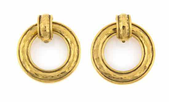 Appraisal: A Pair of Chanel Goldtone Hammered Hoop Earclips Stamped Chanel