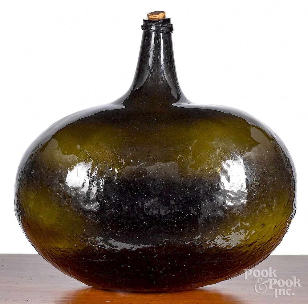 Appraisal: Olive green glass demijohn Olive green glass demijohn h Condition