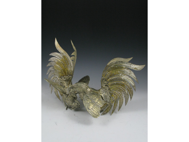 Appraisal: Pair of Silverplate Cocks th c -