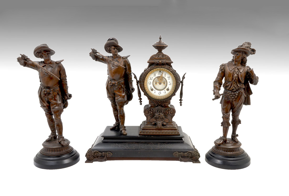 Appraisal: ANSONIA FIGURAL MUSKETEERS CLOCK GARNITURE SET Mantle clock with spelter