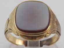 Appraisal: A yellow metal tests carat gold agate set signet ring