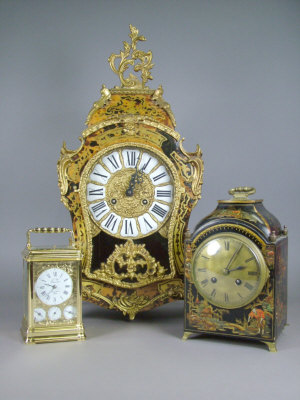 Appraisal: A late th century rococo style boulle mantel clock the