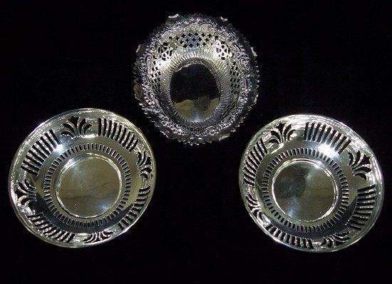 Appraisal: A pair of sweetmeat dishes of pierced circular form maker's