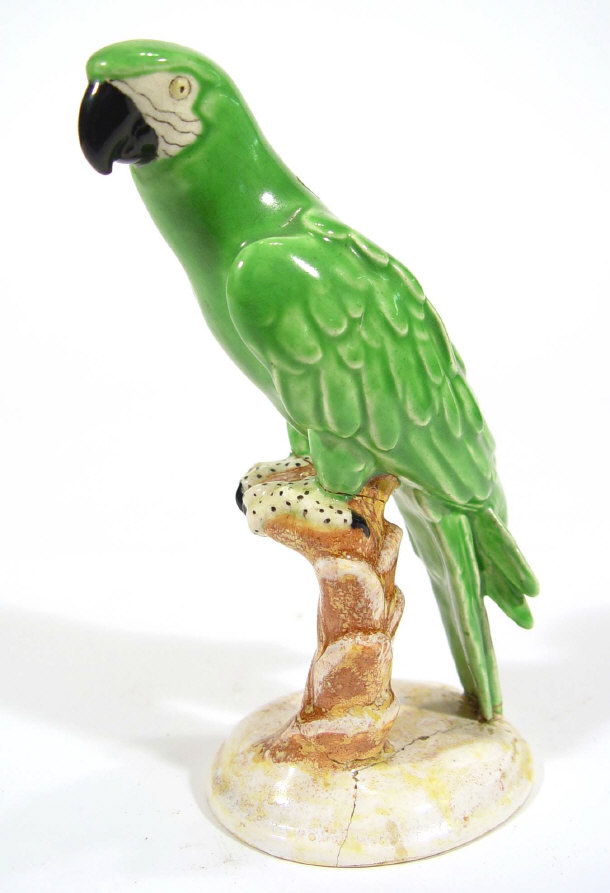 Appraisal: Hand painted Austrian pottery parrot on a branch impressed and