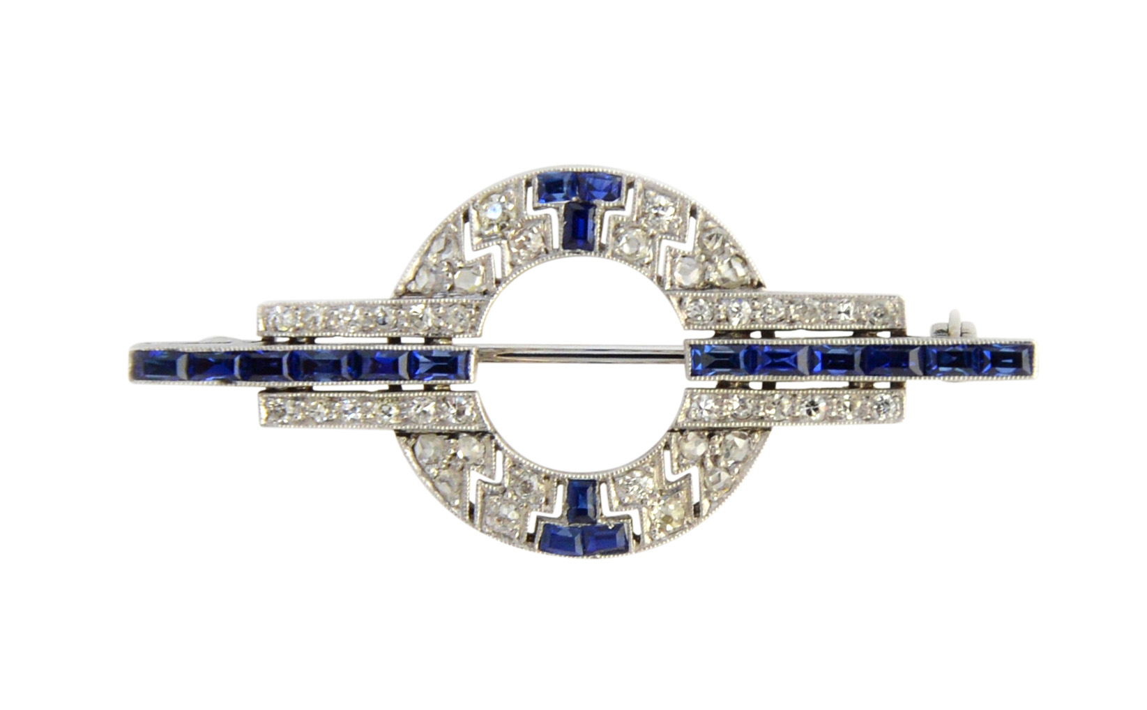 Appraisal: A sapphire and diamond brooch in a geometric and circular