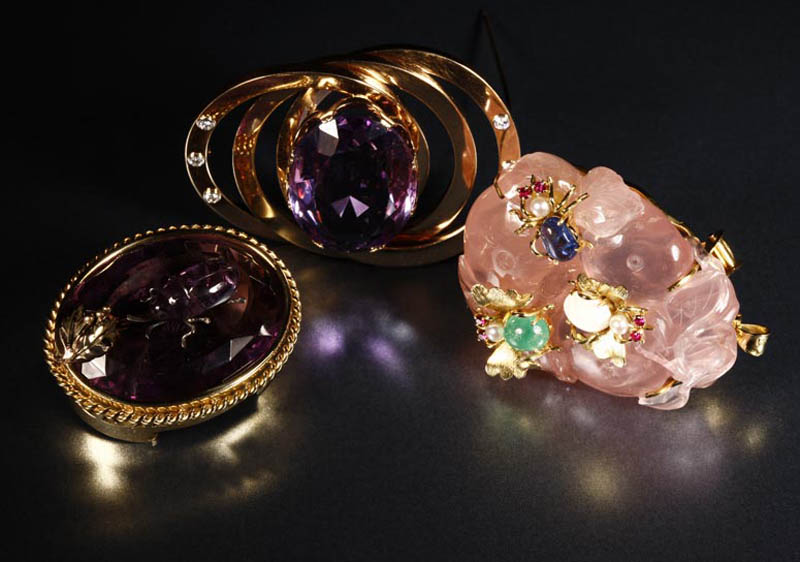 Appraisal: Three gem set brooches Three gem set broochesIncluding a large