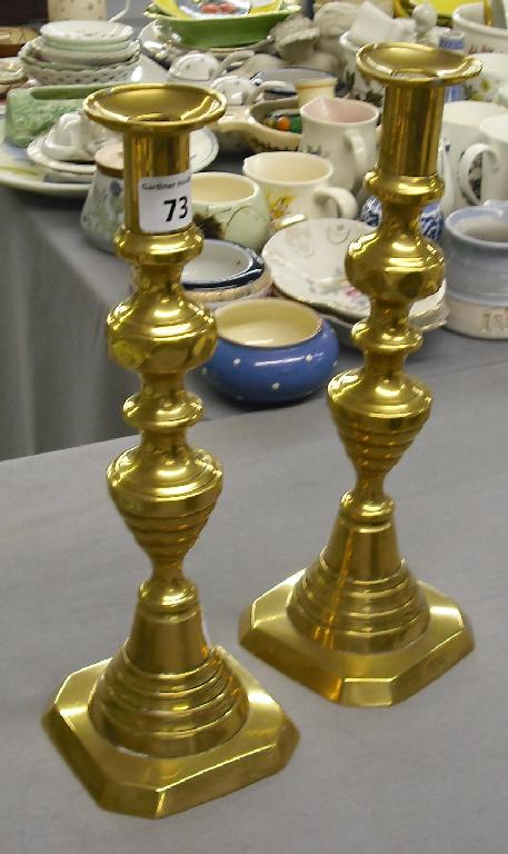 Appraisal: Tall pair of Victorian turned brass candlesticks high