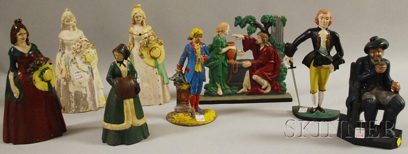 Appraisal: Eight Painted Cast Iron Figural Doorstops four belles two gentlemen