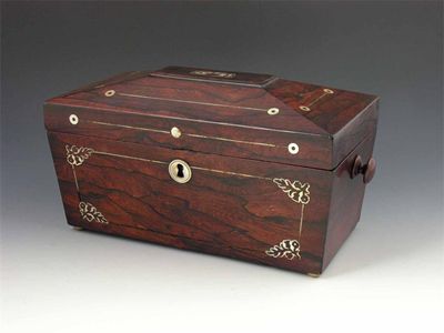 Appraisal: A Victorian rosewood sarcophagus shape work box previously a tea