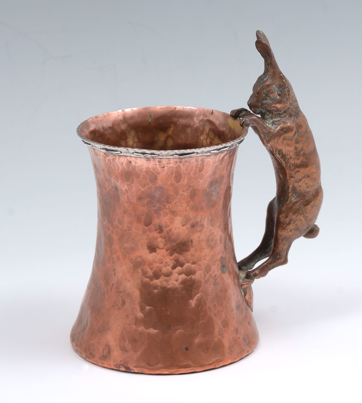 Appraisal: JOSEPH HEINRICH ARTS CRAFTS COPPER SILVER RABBIT MUG Hammered copper