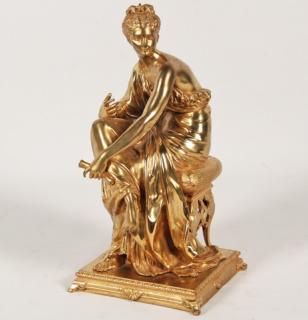 Appraisal: FRENCH DORE BRONZE CLASSICAL SCULPTURE OF A SEATED WOMAN HOLDING