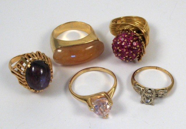 Appraisal: FIVE GEMSTONE AND GOLD RINGS including two k gold one