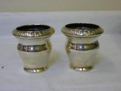 Appraisal: A PAIR OF EDWARDIAN POSY VASES of mildly baluster form