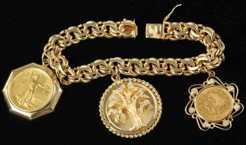 Appraisal: Gold Charm Bracelet with Charmsbracelet of flat curb link design