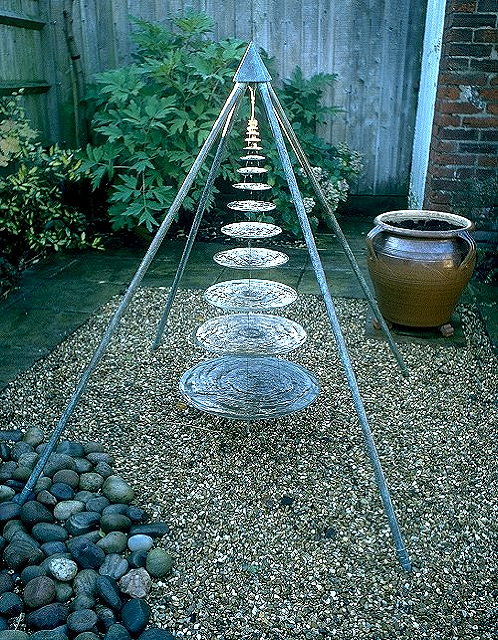 Appraisal: A COPPER AND STAINLESS STEEL WATER SCULPTURE BY BARRY MASON