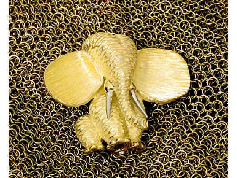 Appraisal: HENRY DUNAY BROOCH Elephant design with textured finish and platinum