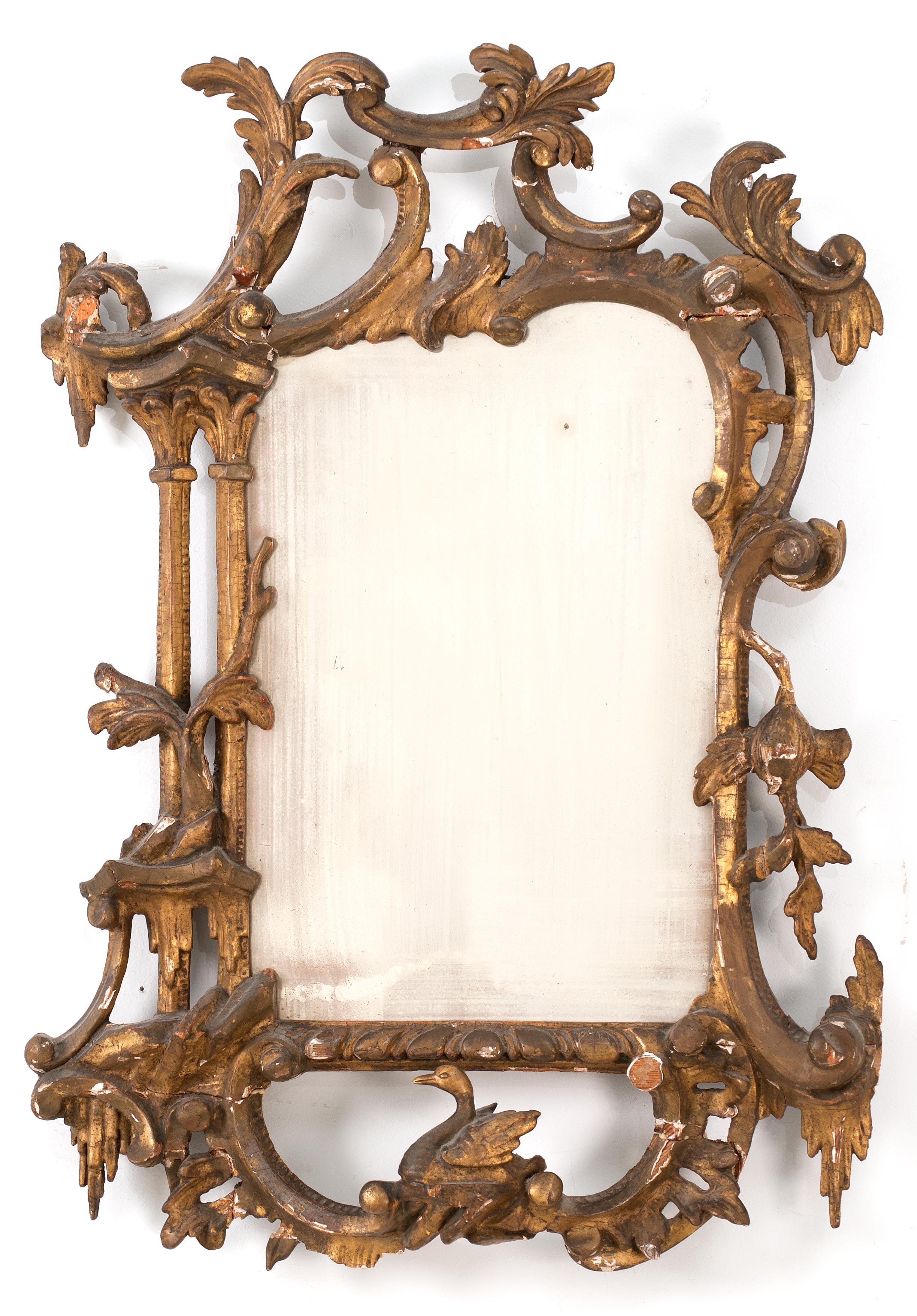 Appraisal: CONTINENTAL MIRROR th CenturyOrnate gilt frame in a twisting foliate