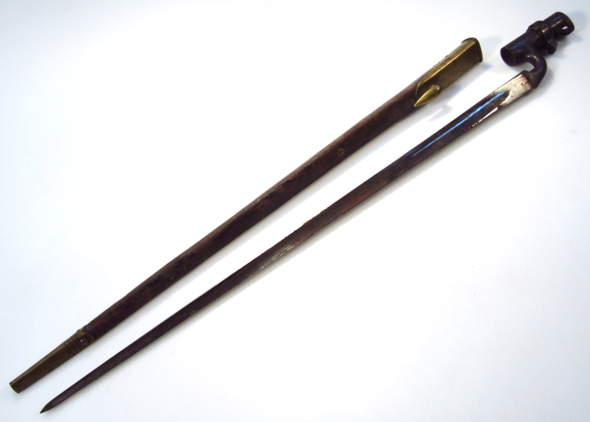 Appraisal: A RWD bayonet and scabbard with shaped blade brass ended