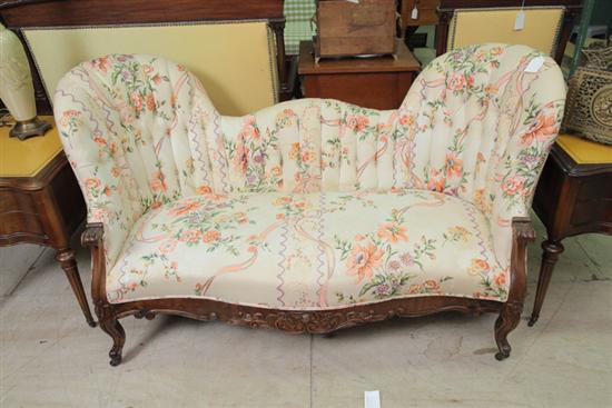 Appraisal: SOFA Cream floral upholstery with knuckled arms cabriole legs and