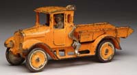 Appraisal: RARE ORANGE ARCADE INTERNATIONAL HARVESTER TRUCK Usually found in red